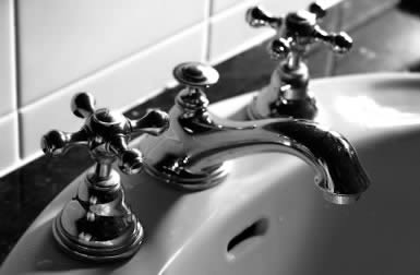 black and white faucet installation